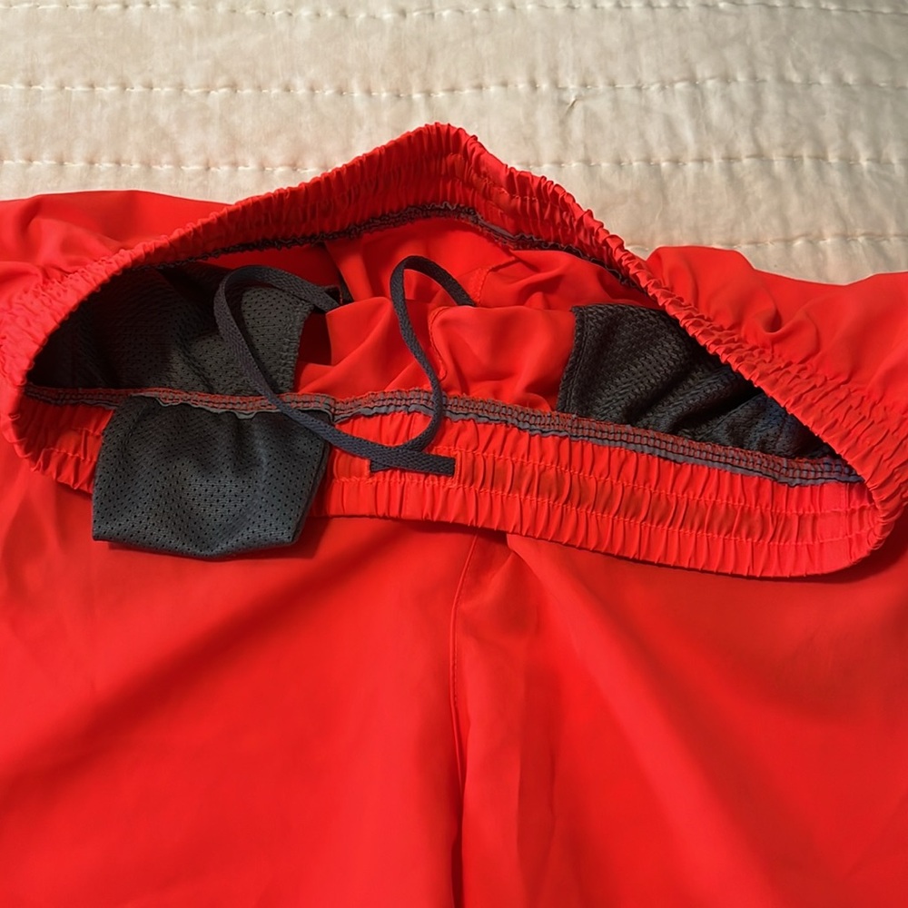 Under Armour 5in shorts. Size Large. Orange - Picture 2 of 4